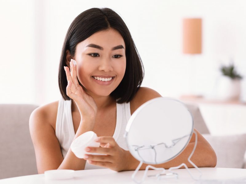 young-asian-woman-applying-cream-on-her-face-JHW35LJ-scaled.jpg young-asian-woman-applying-cream-on-her-face-JHW35LJ-scaled.jpg